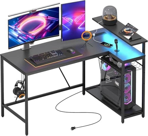 Bestier 132.5CM L-Shaped Workstation with Carbon Fibre Surface, 3 Power Outlets & 2 USB Ports, LED Strip Lights – Reversible Corner Unit with Shelves & Hooks for Home Office & Gaming